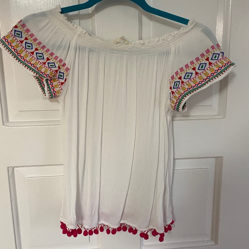 off the shoulder top with pom pom trim